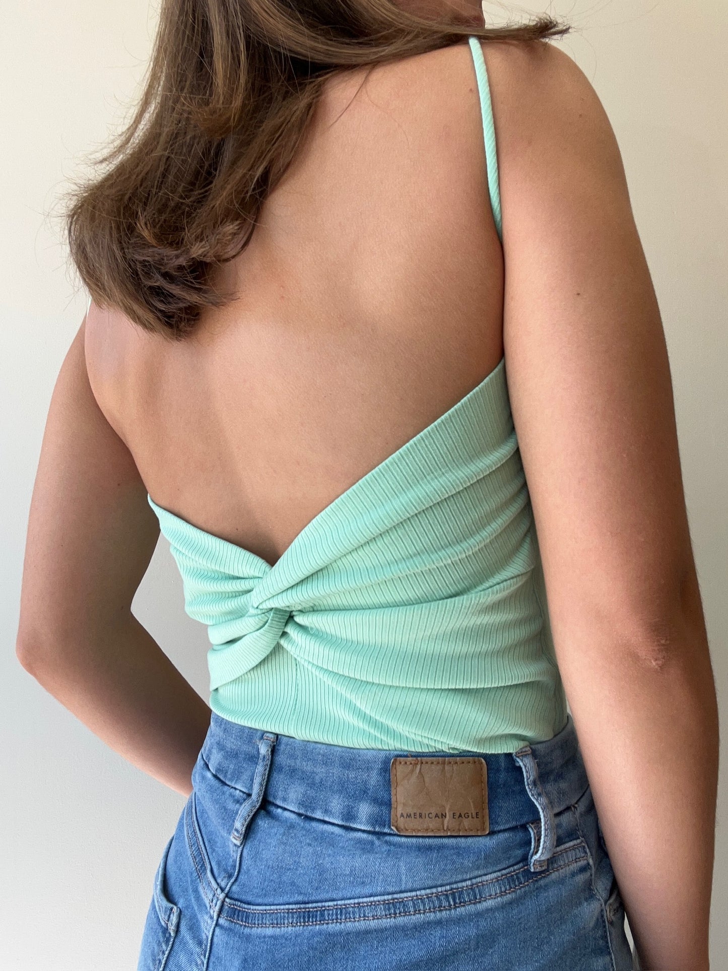 TWIST BACK BODYSUIT